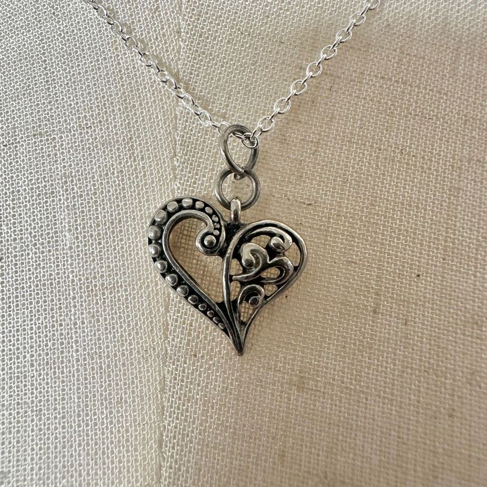 Silver tone heart pendant necklace